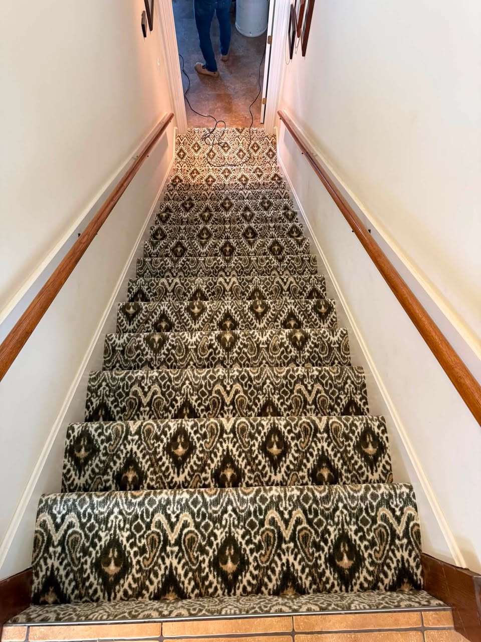 Milliken Artisan patterned stair carpet in the color Olive Wood.