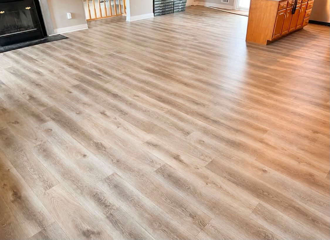 True Touch Momentum organic hardwood in the color Stucco, in an open living room.