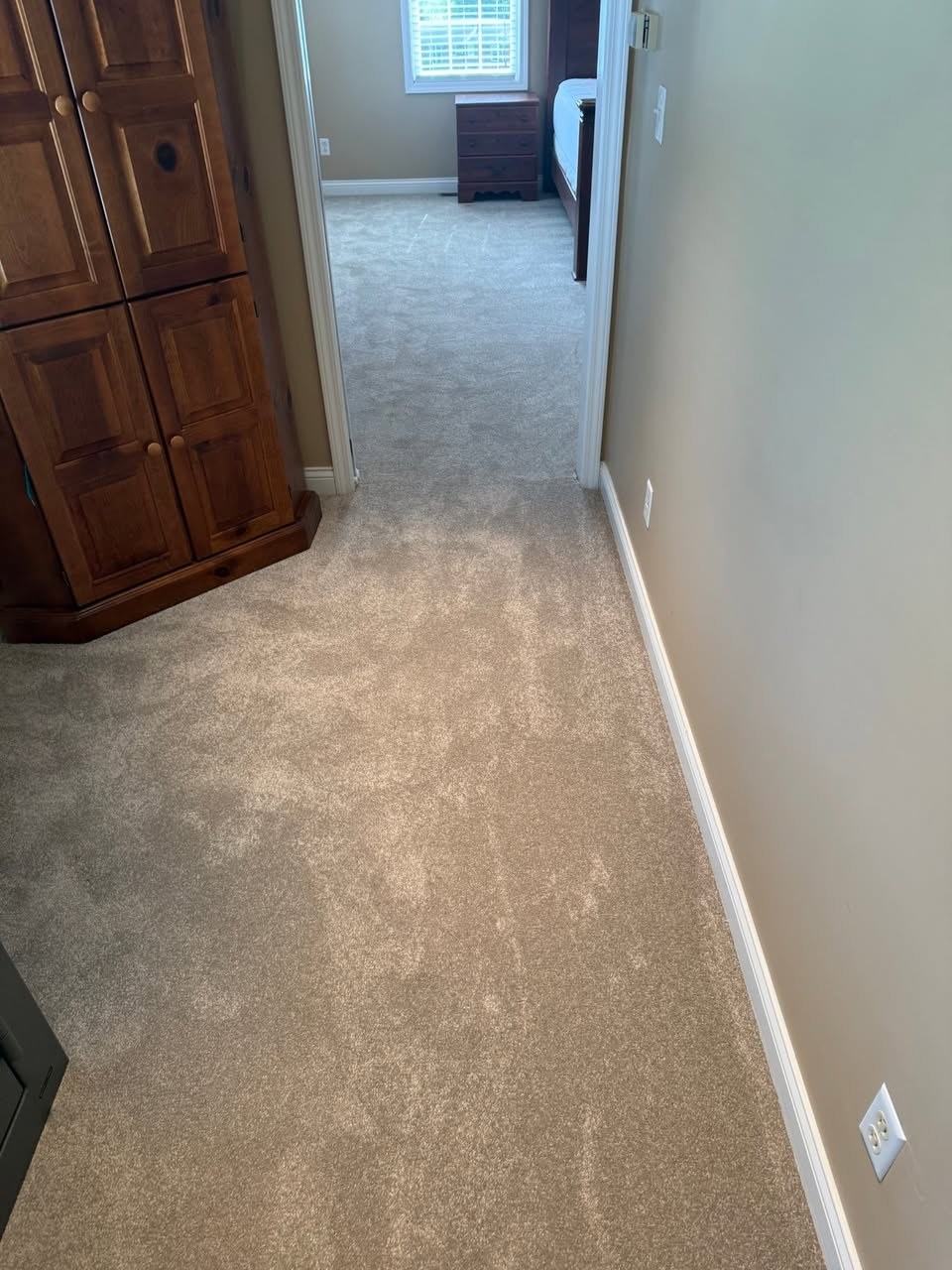 ShawMark Anything Goes Spellbound carpet in the color Mocha, down a hallway.
