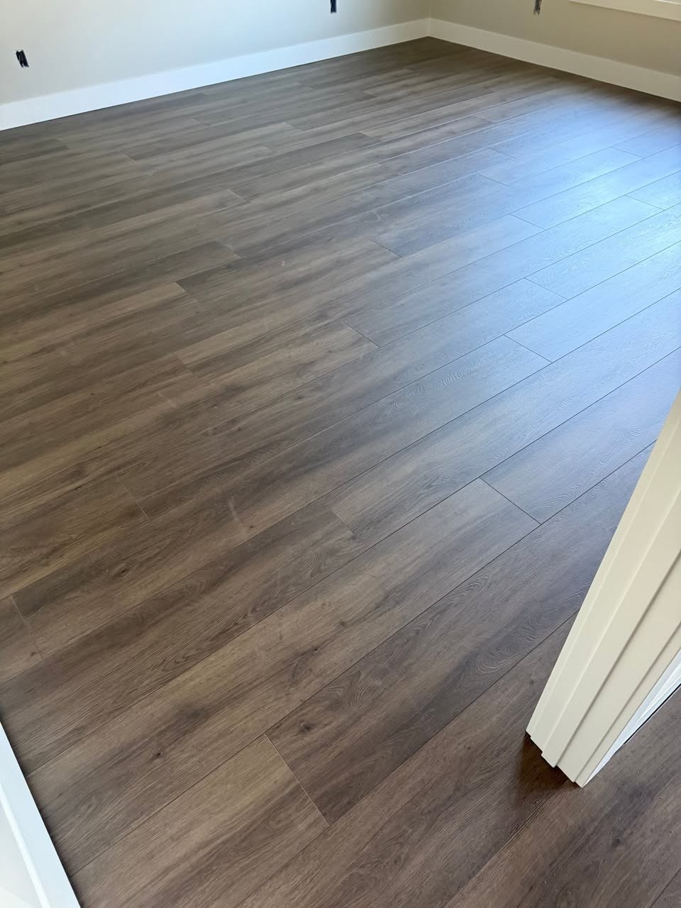 Audacity Symphony flooring in the color Huston, in a new basement.